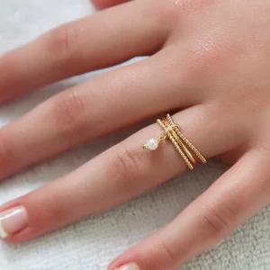 Bague triple anneaux plaqué or petite perle blanche