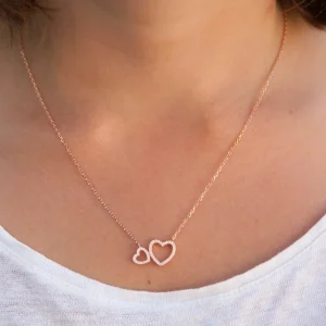 Collier 2 coeurs sertis de zircons plaqué or rose